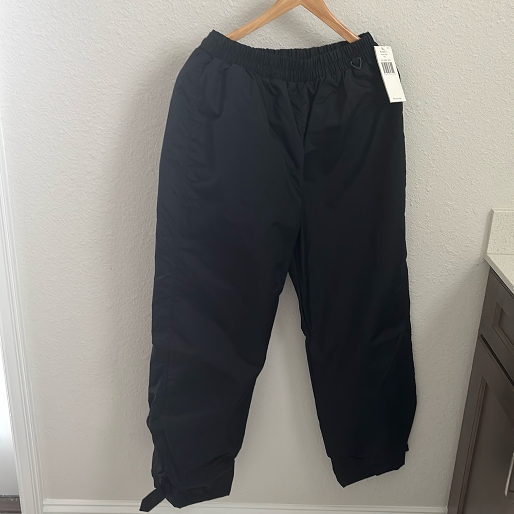 Powder Pants - ladies large 
NEW with tags